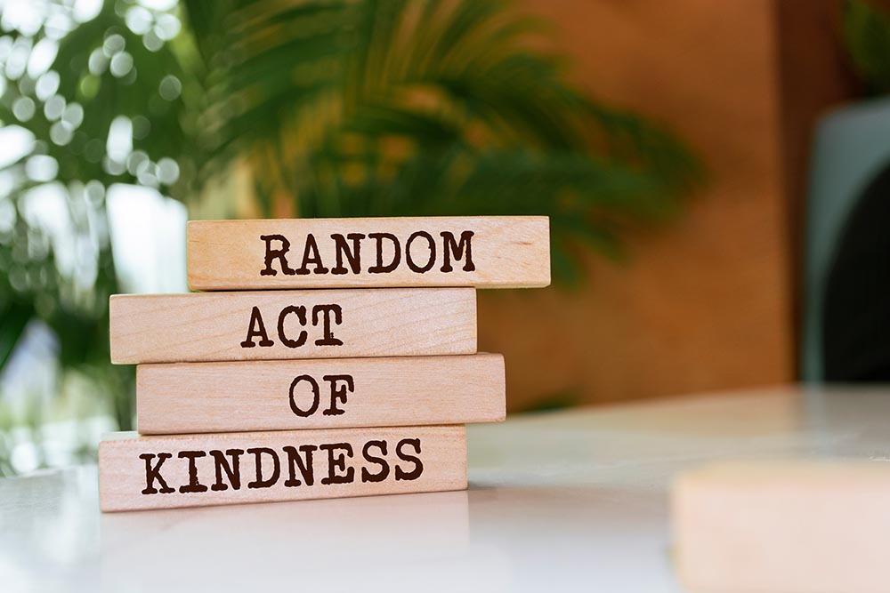Wooden blocks with 'Random Act of Kindness' text