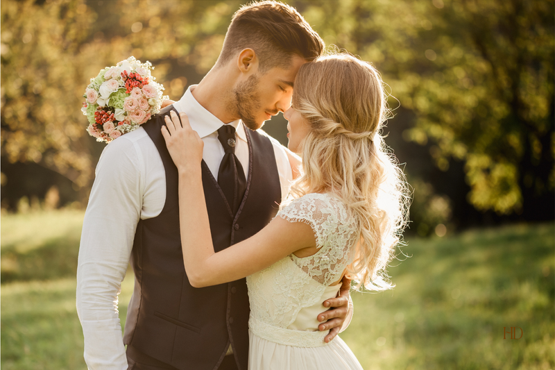 Couple in wedding attire sharing a moment