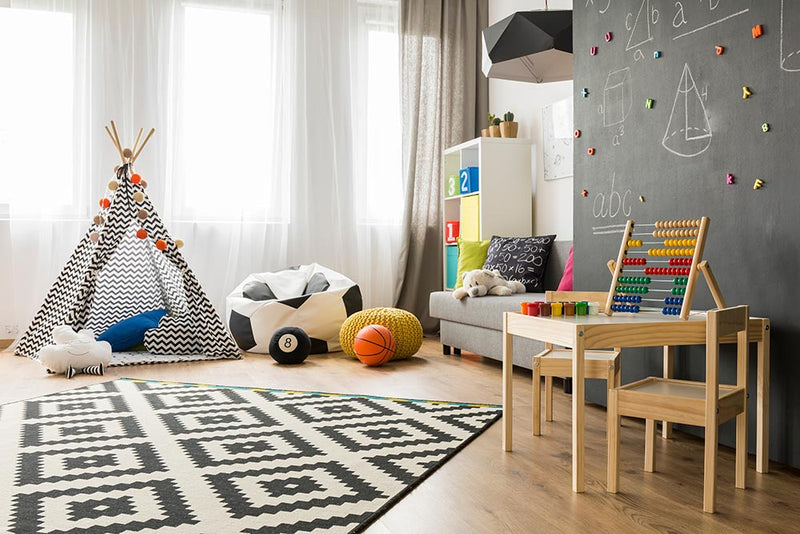 organizing with a baby Children's playroom with toys and furniture