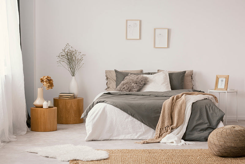 How to Declutter Your Bedroom and Make It a Sanctuary Cozy bedroom with neutral-toned decor