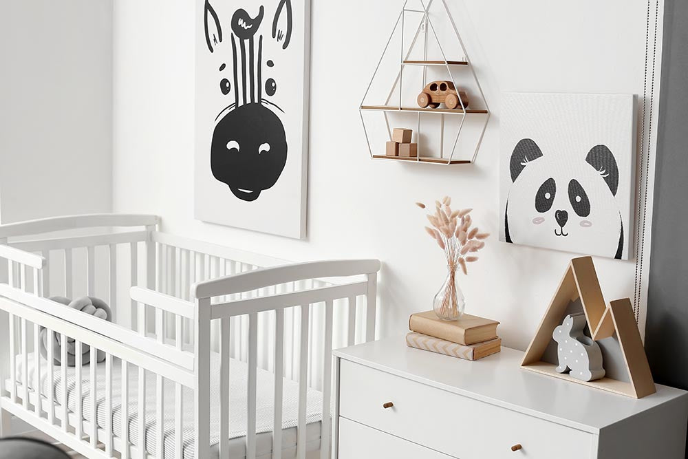 Neutral baby nursery with animal decor