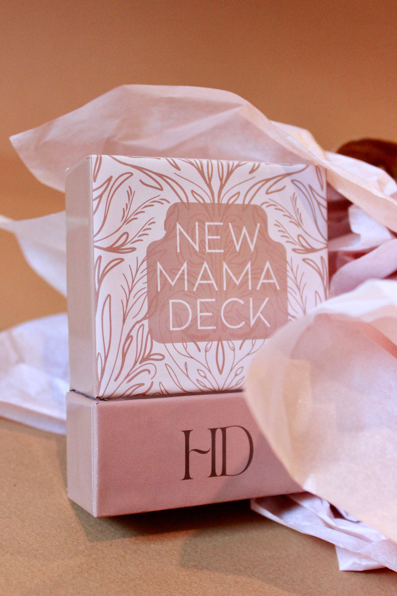 Close-up of New Mama Deck box advice for new moms