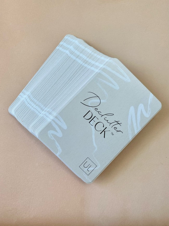 Declutter Deck box on beige surface home organization tips