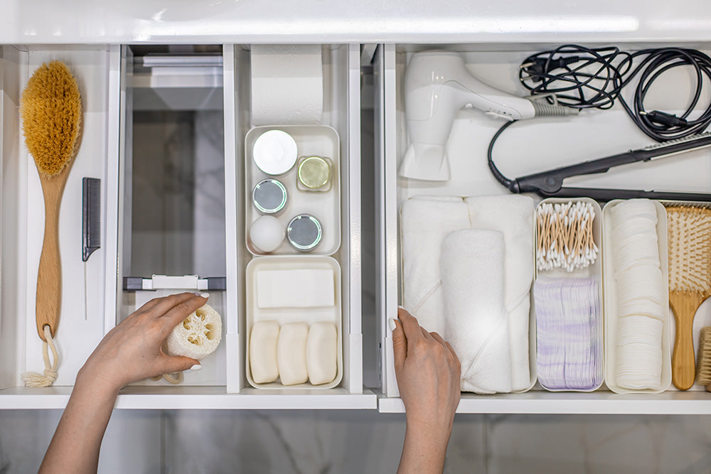 Organized kitchen drawer with decluttering products