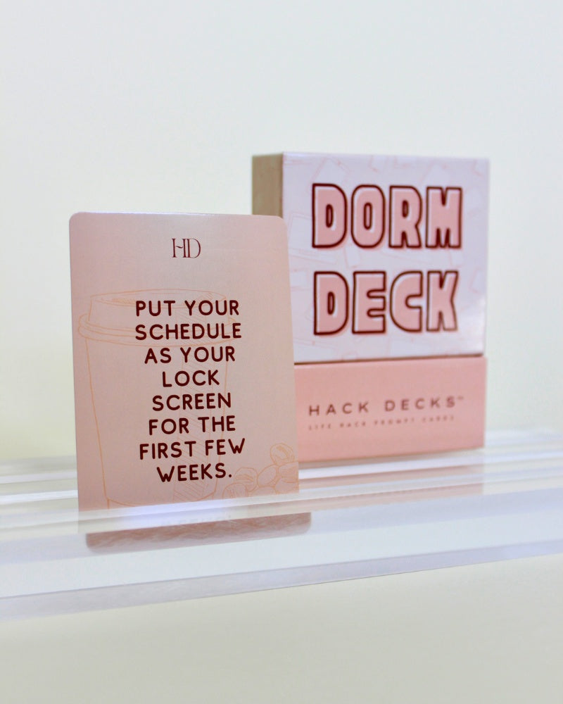 Two 'Dorm Deck' cards on a white surface with a light background