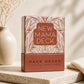 Product packaging with New Mama Deck text on a decorative background