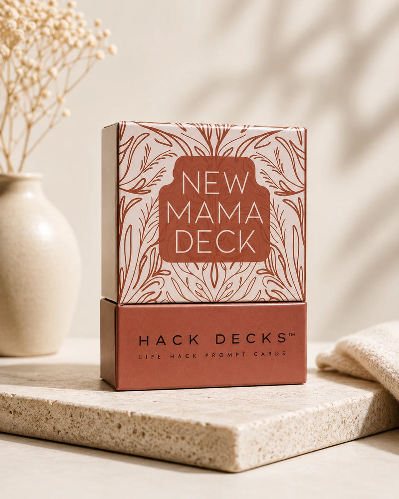 Product packaging with New Mama Deck text on a decorative background