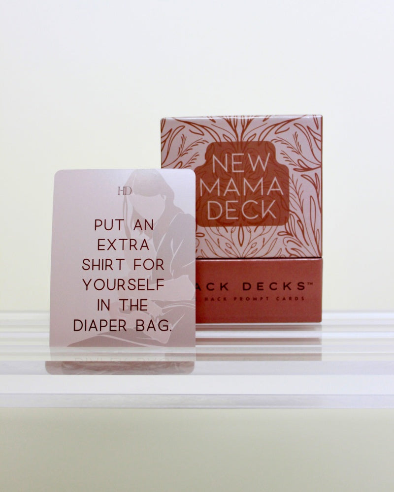 New Mama Deck packaging with instructional message on a light background