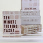 Stack of Hack Decks productivity cards on a white surface with a light yellow background